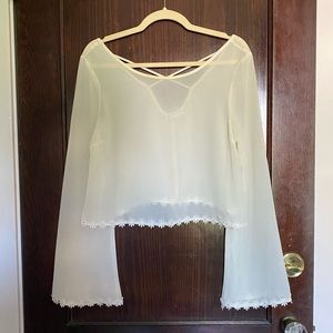 Sheer bell sleeve top